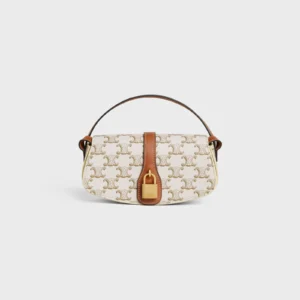 CLUTCH ON STRAP TABOU in Triomphe canvas and calfskin