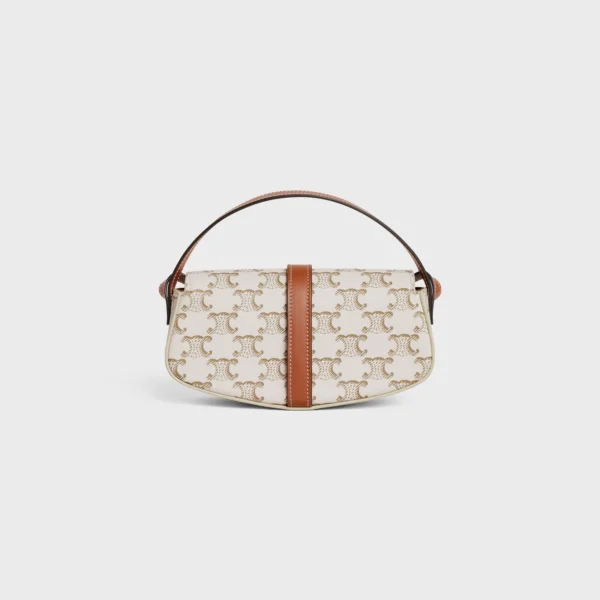 CLUTCH ON STRAP TABOU in Triomphe canvas and calfskin