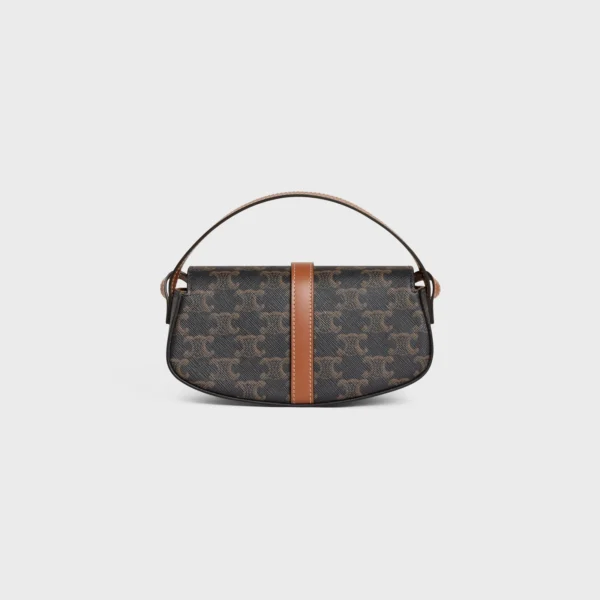 CLUTCH ON STRAP TABOU in Triomphe canvas and calfskin